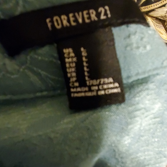 FLORAL PRINT MINI SKIRT - Picture 3 of 3